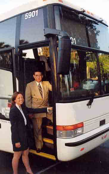 bus driver and tour guide at work